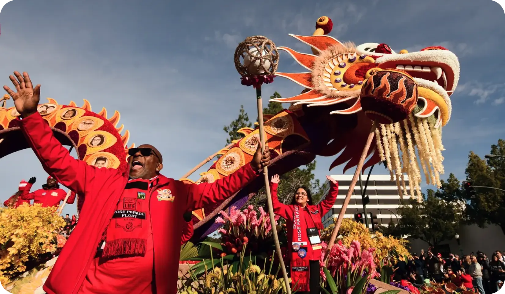 Image of people celebrating on a parade float